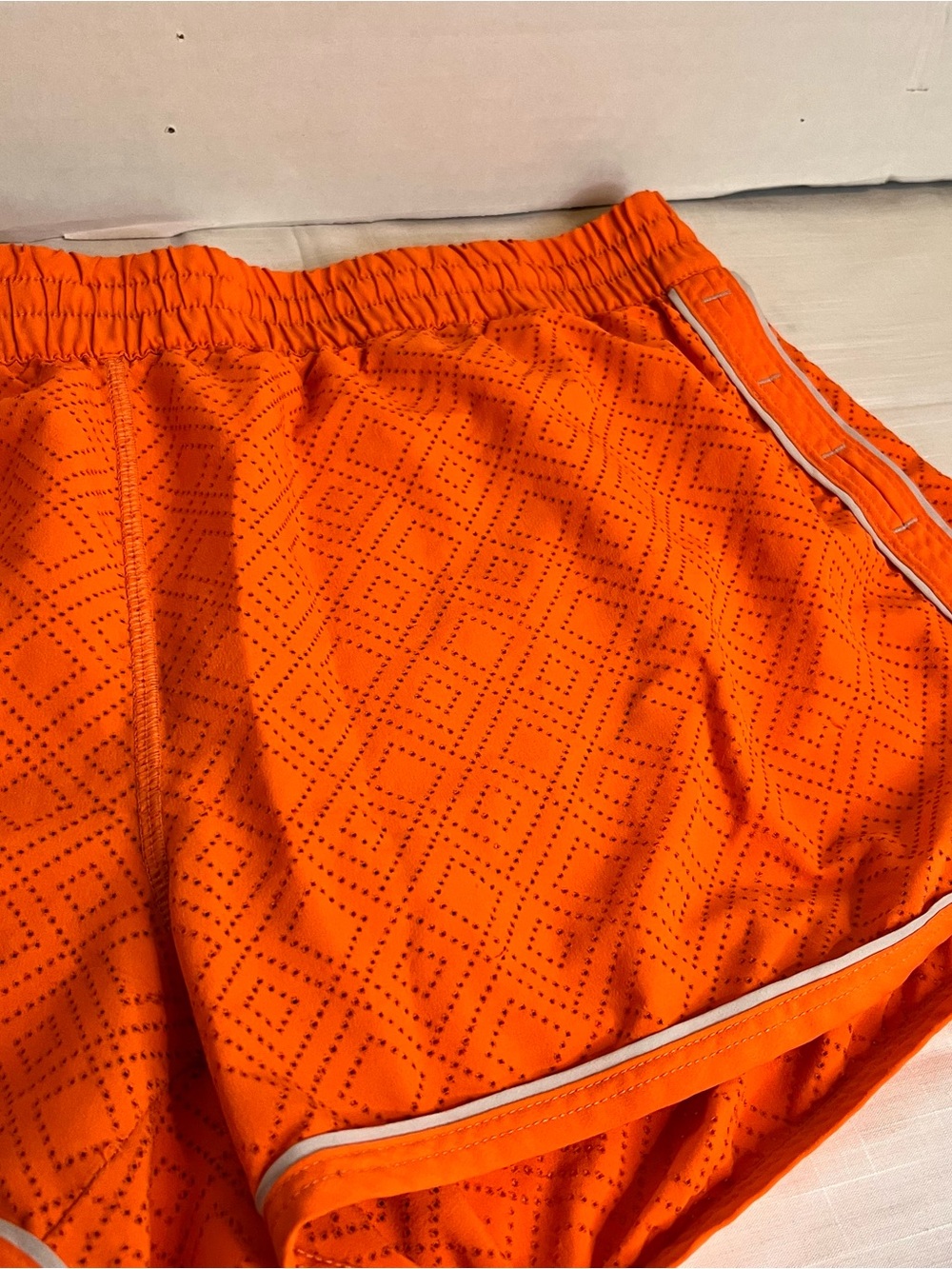 Under Armour Women's Bright Orange Perforated Athletic Shorts
